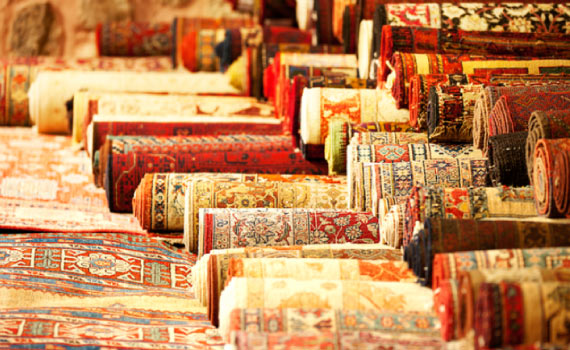 Display of rolled rugs